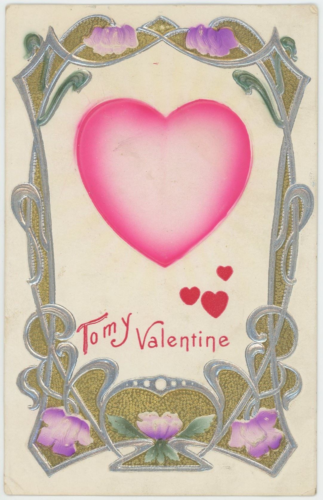 Valentines card with a large pink heart, small red hearts, and purple flowers, with a message.